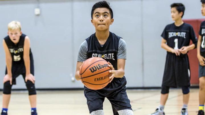 boys playing basketball